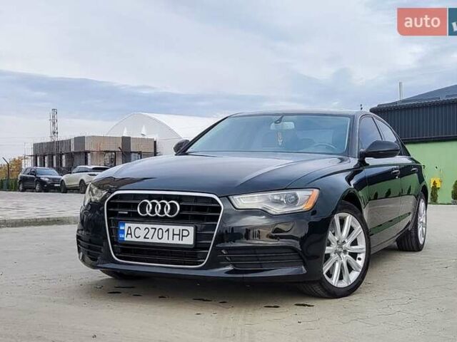 Черный Ауди А6, объемом двигателя 2 л и пробегом 231 тыс. км за 12200 $, фото 1 на Automoto.ua