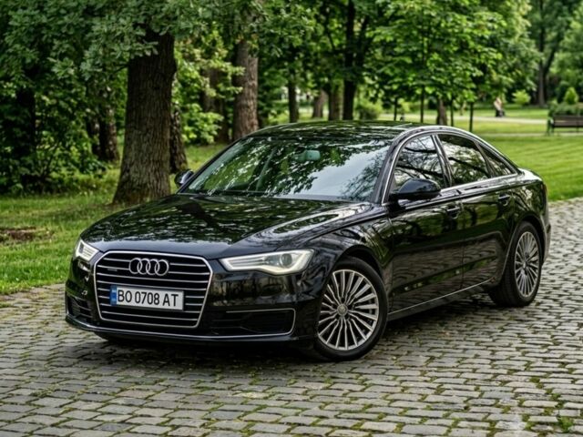Чорний Ауді А6, об'ємом двигуна 2 л та пробігом 227 тис. км за 13731 $, фото 1 на Automoto.ua