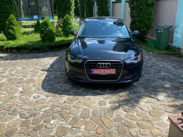 Черный Ауди А6, объемом двигателя 2 л и пробегом 225 тыс. км за 11300 $, фото 1 на Automoto.ua