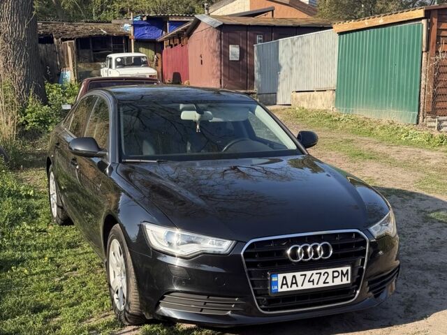 Черный Ауди А6, объемом двигателя 2 л и пробегом 180 тыс. км за 14000 $, фото 1 на Automoto.ua