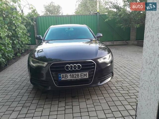 Черный Ауди А6, объемом двигателя 2 л и пробегом 260 тыс. км за 16000 $, фото 1 на Automoto.ua