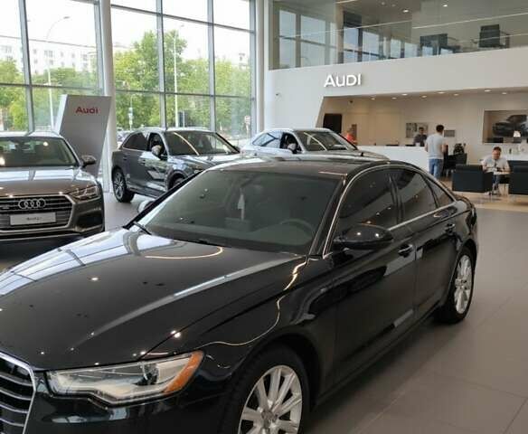 Черный Ауди А6, объемом двигателя 1.98 л и пробегом 173 тыс. км за 15800 $, фото 1 на Automoto.ua