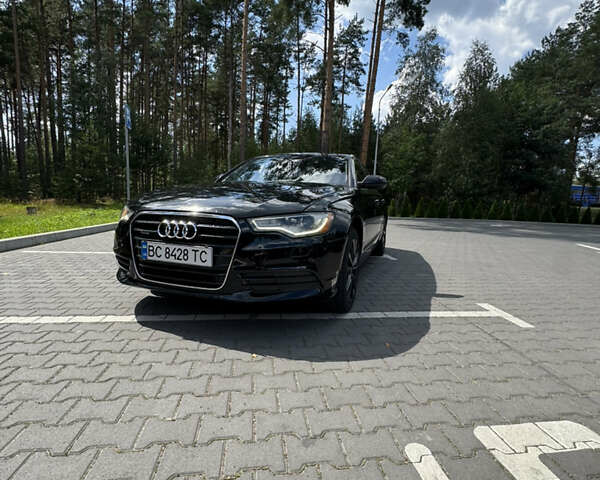 Черный Ауди А6, объемом двигателя 2 л и пробегом 243 тыс. км за 14500 $, фото 1 на Automoto.ua