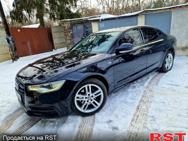 Черный Ауди А6, объемом двигателя 2 л и пробегом 190 тыс. км за 15000 $, фото 1 на Automoto.ua