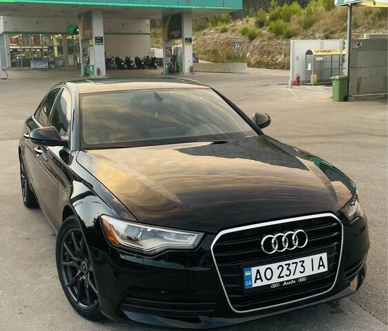 Черный Ауди А6, объемом двигателя 2 л и пробегом 165 тыс. км за 14600 $, фото 1 на Automoto.ua