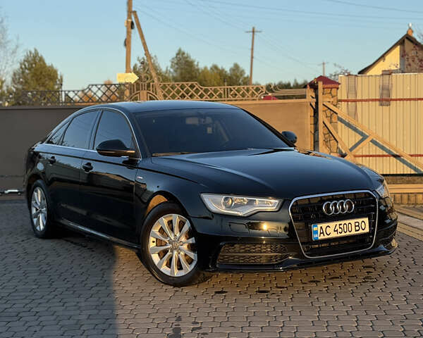 Черный Ауди А6, объемом двигателя 2 л и пробегом 197 тыс. км за 16200 $, фото 1 на Automoto.ua
