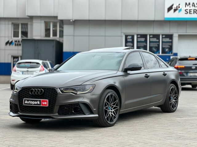 Чорний Ауді А6, об'ємом двигуна 2 л та пробігом 225 тис. км за 15940 $, фото 1 на Automoto.ua