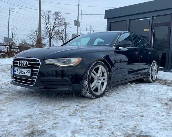 Черный Ауди А6, объемом двигателя 2 л и пробегом 225 тыс. км за 11900 $, фото 1 на Automoto.ua