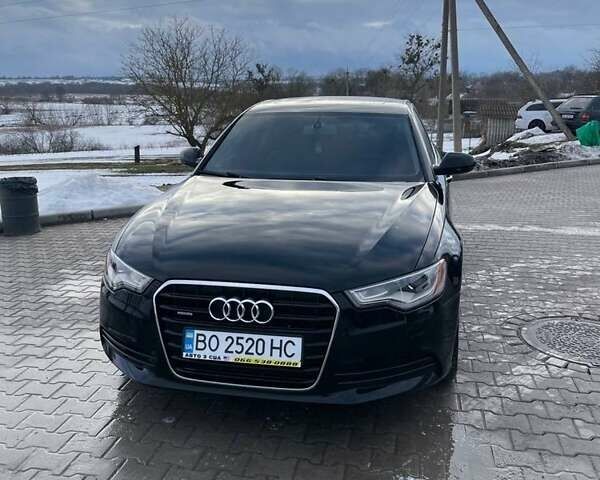 Черный Ауди А6, объемом двигателя 2 л и пробегом 198 тыс. км за 13300 $, фото 1 на Automoto.ua