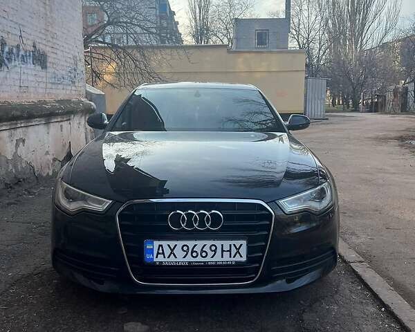 Чорний Ауді А6, об'ємом двигуна 2 л та пробігом 124 тис. км за 17000 $, фото 1 на Automoto.ua