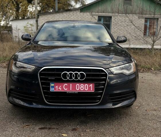Черный Ауди А6, объемом двигателя 2 л и пробегом 210 тыс. км за 13300 $, фото 1 на Automoto.ua