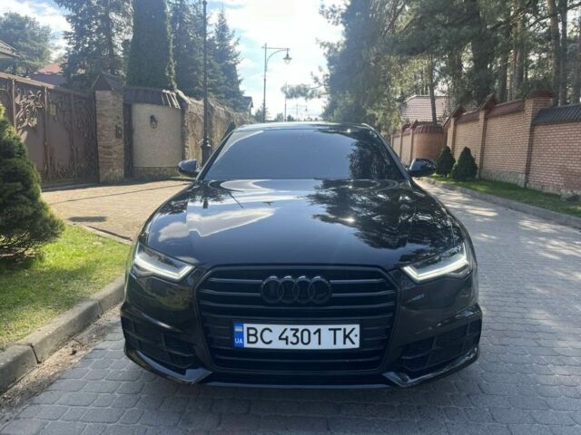 Черный Ауди А6, объемом двигателя 1.8 л и пробегом 238 тыс. км за 15500 $, фото 1 на Automoto.ua