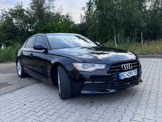 Чорний Ауді А6, об'ємом двигуна 1.98 л та пробігом 209 тис. км за 12400 $, фото 1 на Automoto.ua