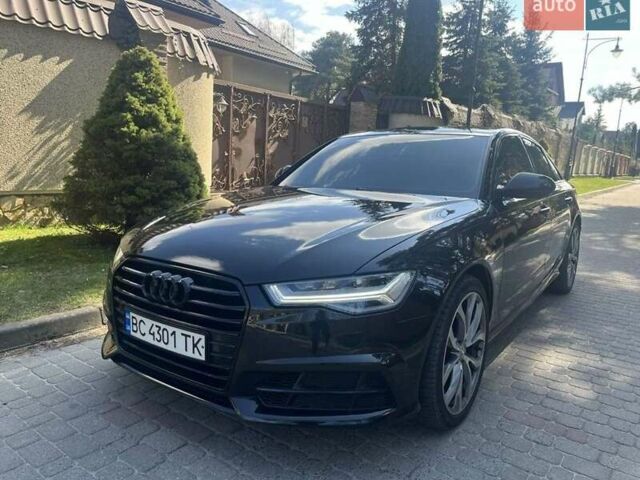 Черный Ауди А6, объемом двигателя 1.8 л и пробегом 238 тыс. км за 15500 $, фото 1 на Automoto.ua