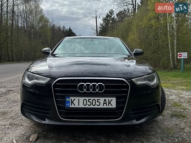 Черный Ауди А6, объемом двигателя 1.98 л и пробегом 175 тыс. км за 12000 $, фото 1 на Automoto.ua