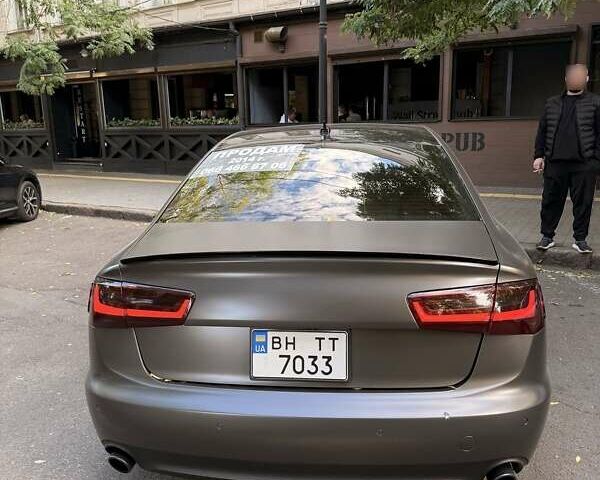Черный Ауди А6, объемом двигателя 2 л и пробегом 225 тыс. км за 15500 $, фото 1 на Automoto.ua