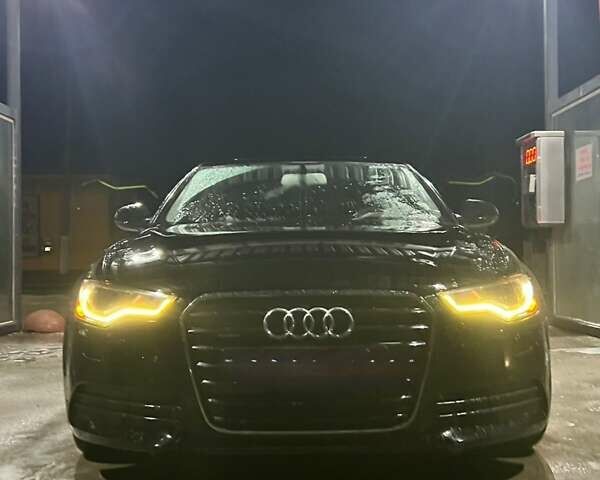 Чорний Ауді А6, об'ємом двигуна 2 л та пробігом 199 тис. км за 12000 $, фото 1 на Automoto.ua