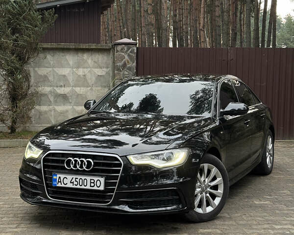 Черный Ауди А6, объемом двигателя 2 л и пробегом 199 тыс. км за 15500 $, фото 1 на Automoto.ua