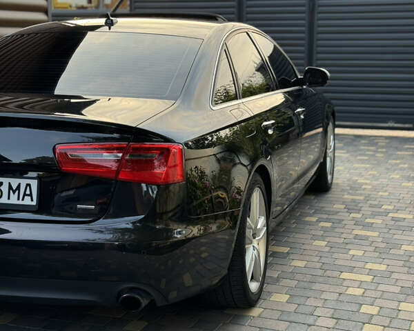 Черный Ауди А6, объемом двигателя 2 л и пробегом 175 тыс. км за 15800 $, фото 1 на Automoto.ua