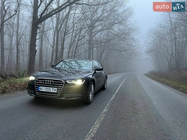 Чорний Ауді А6, об'ємом двигуна 1.98 л та пробігом 240 тис. км за 13600 $, фото 1 на Automoto.ua