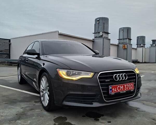 Черный Ауди А6, объемом двигателя 2 л и пробегом 185 тыс. км за 12600 $, фото 1 на Automoto.ua