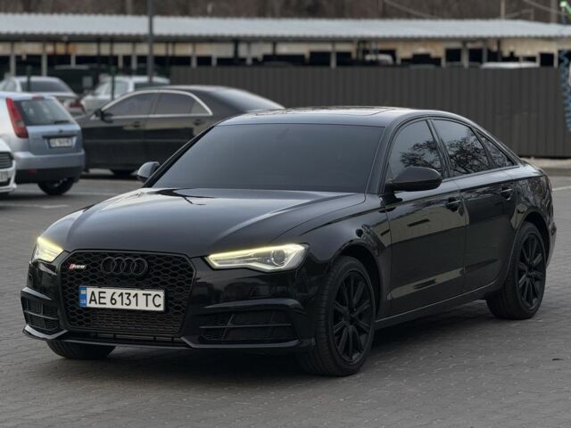 Черный Ауди А6, объемом двигателя 2 л и пробегом 237 тыс. км за 12799 $, фото 1 на Automoto.ua