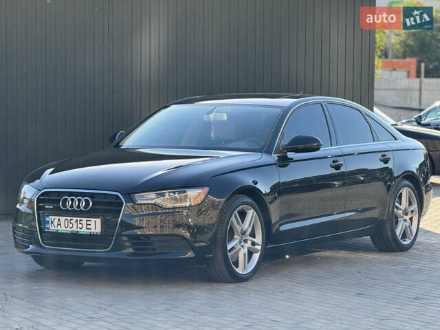 Черный Ауди А6, объемом двигателя 1.98 л и пробегом 232 тыс. км за 12500 $, фото 1 на Automoto.ua