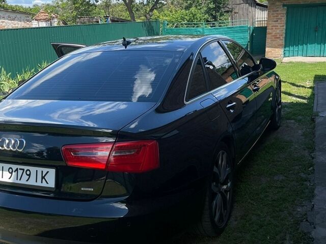 Черный Ауди А6, объемом двигателя 2 л и пробегом 153 тыс. км за 16600 $, фото 1 на Automoto.ua