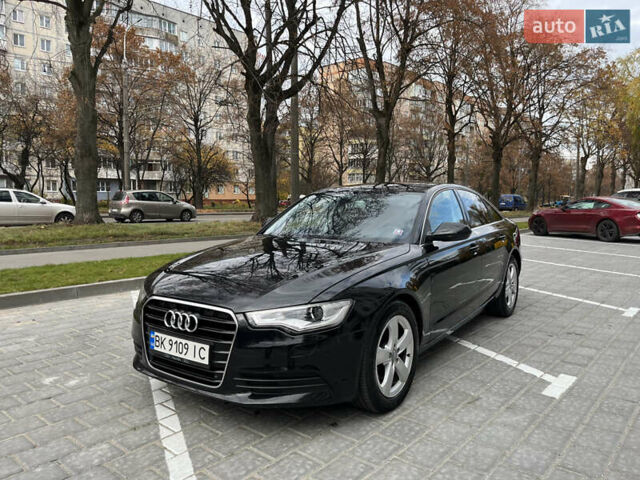 Чорний Ауді А6, об'ємом двигуна 2 л та пробігом 285 тис. км за 13999 $, фото 1 на Automoto.ua