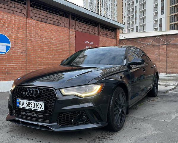 Черный Ауди А6, объемом двигателя 1.98 л и пробегом 154 тыс. км за 17600 $, фото 1 на Automoto.ua