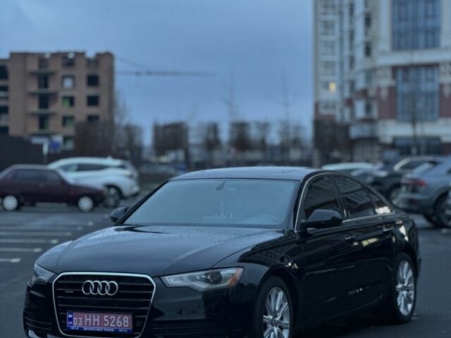 Черный Ауди А6, объемом двигателя 2 л и пробегом 217 тыс. км за 12500 $, фото 1 на Automoto.ua