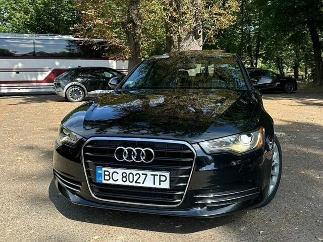 Черный Ауди А6, объемом двигателя 1.98 л и пробегом 162 тыс. км за 13700 $, фото 1 на Automoto.ua