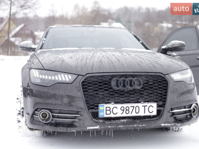 Чорний Ауді А6, об'ємом двигуна 3 л та пробігом 212 тис. км за 18299 $, фото 1 на Automoto.ua