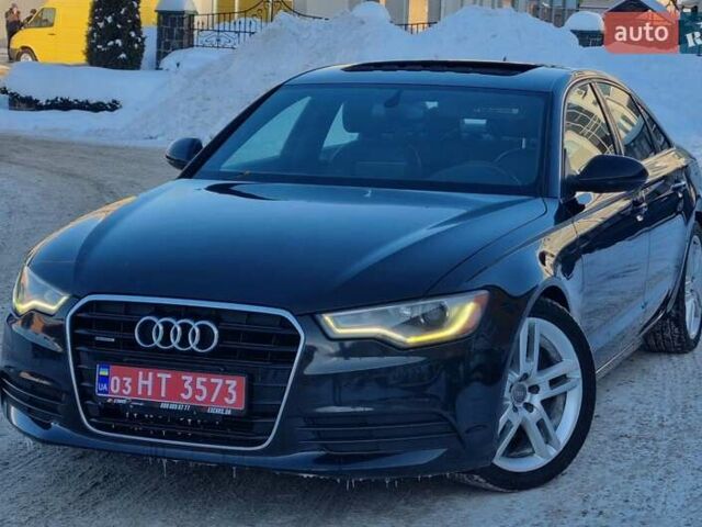 Чорний Ауді А6, об'ємом двигуна 2 л та пробігом 223 тис. км за 12599 $, фото 1 на Automoto.ua