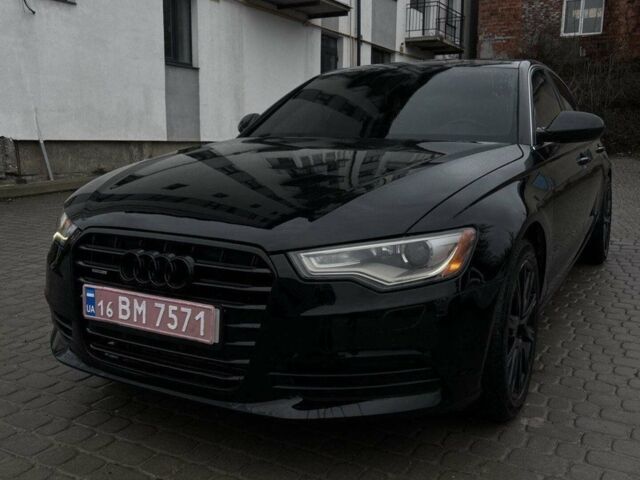 Чорний Ауді А6, об'ємом двигуна 2 л та пробігом 137 тис. км за 13450 $, фото 1 на Automoto.ua