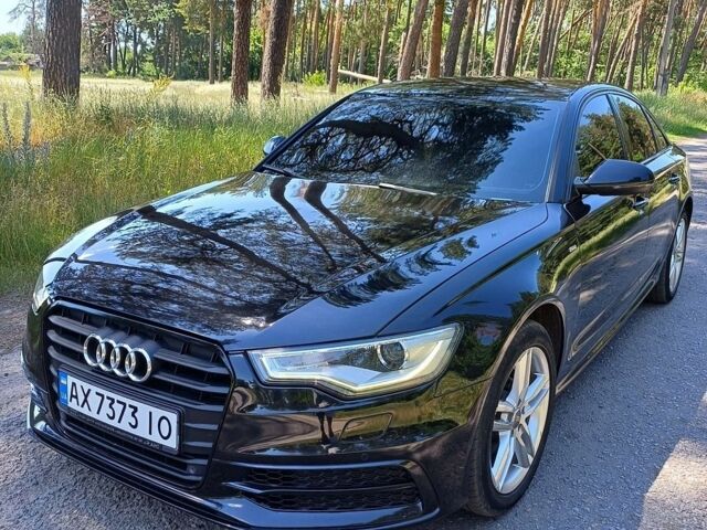 Черный Ауди А6, объемом двигателя 2 л и пробегом 206 тыс. км за 15300 $, фото 1 на Automoto.ua