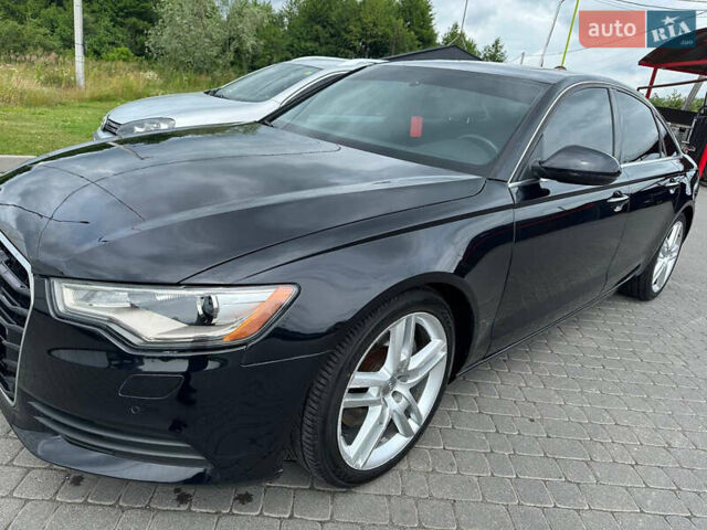 Черный Ауди А6, объемом двигателя 1.98 л и пробегом 144 тыс. км за 14499 $, фото 1 на Automoto.ua