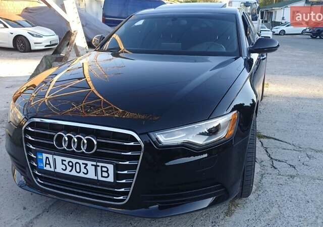 Черный Ауди А6, объемом двигателя 1.98 л и пробегом 209 тыс. км за 15500 $, фото 1 на Automoto.ua