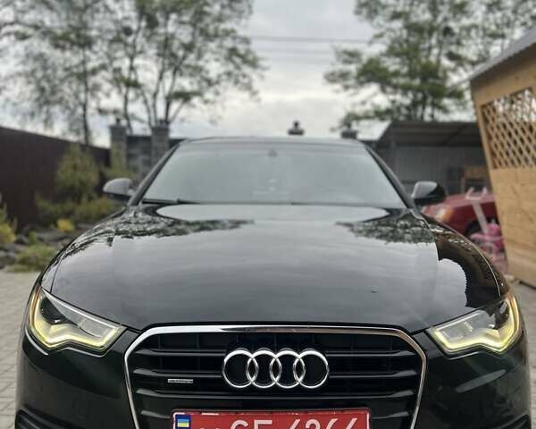Черный Ауди А6, объемом двигателя 2 л и пробегом 150 тыс. км за 13000 $, фото 1 на Automoto.ua