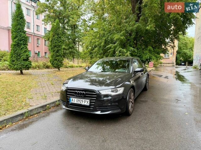 Чорний Ауді А6, об'ємом двигуна 1.98 л та пробігом 200 тис. км за 16800 $, фото 1 на Automoto.ua