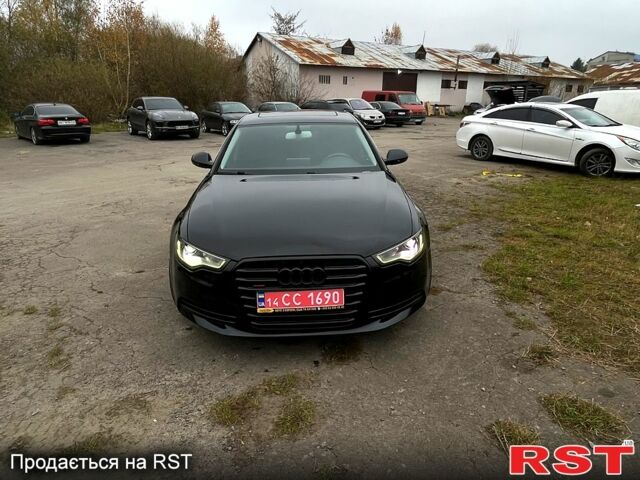 Черный Ауди А6, объемом двигателя 20 л и пробегом 188 тыс. км за 13600 $, фото 1 на Automoto.ua