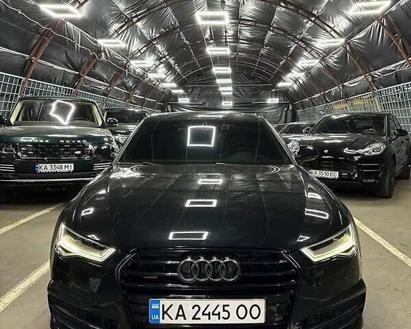 Черный Ауди А6, объемом двигателя 1.98 л и пробегом 191 тыс. км за 24000 $, фото 1 на Automoto.ua
