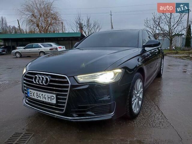 Черный Ауди А6, объемом двигателя 2 л и пробегом 241 тыс. км за 17200 $, фото 1 на Automoto.ua