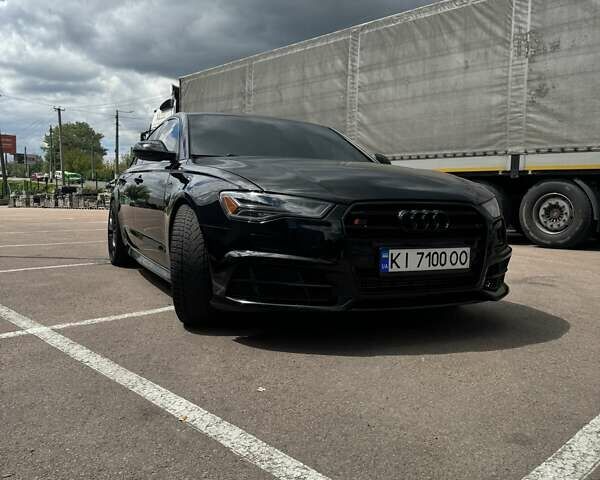 Черный Ауди А6, объемом двигателя 1.98 л и пробегом 204 тыс. км за 19000 $, фото 1 на Automoto.ua