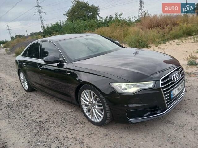 Черный Ауди А6, объемом двигателя 2 л и пробегом 260 тыс. км за 19950 $, фото 1 на Automoto.ua