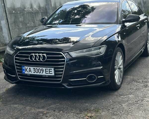 Черный Ауди А6, объемом двигателя 3 л и пробегом 205 тыс. км за 21200 $, фото 1 на Automoto.ua