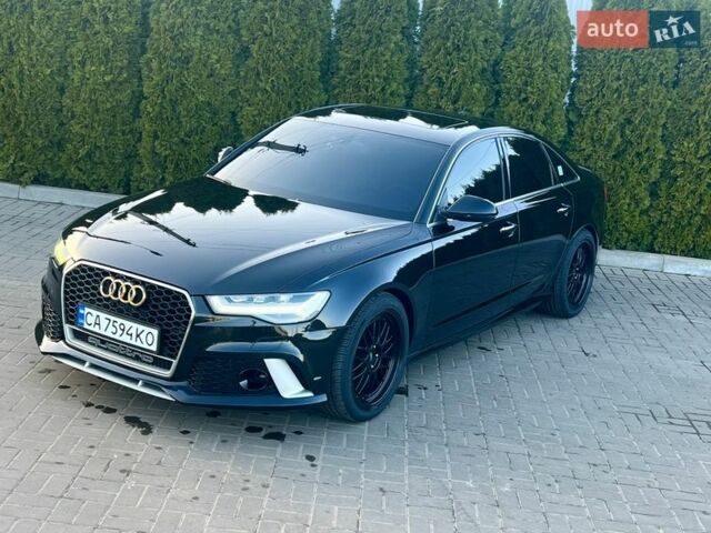 Черный Ауди А6, объемом двигателя 1.97 л и пробегом 159 тыс. км за 22600 $, фото 1 на Automoto.ua