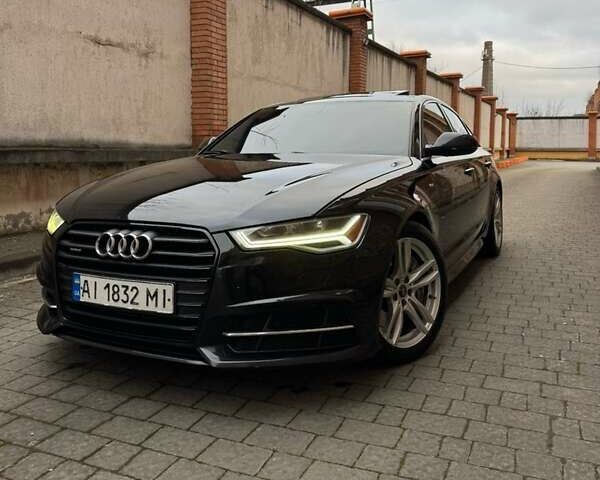 Черный Ауди А6, объемом двигателя 1.98 л и пробегом 240 тыс. км за 15500 $, фото 1 на Automoto.ua