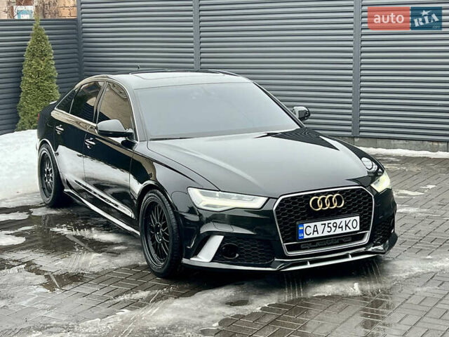 Чорний Ауді А6, об'ємом двигуна 1.97 л та пробігом 159 тис. км за 22600 $, фото 1 на Automoto.ua