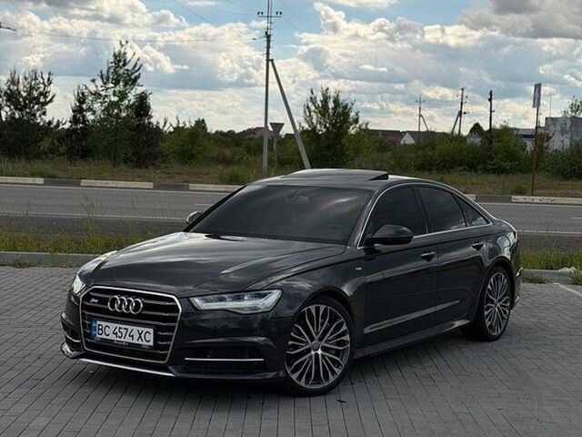 Черный Ауди А6, объемом двигателя 1.98 л и пробегом 167 тыс. км за 16500 $, фото 1 на Automoto.ua